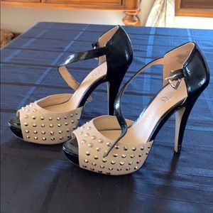 Taupe and black heels